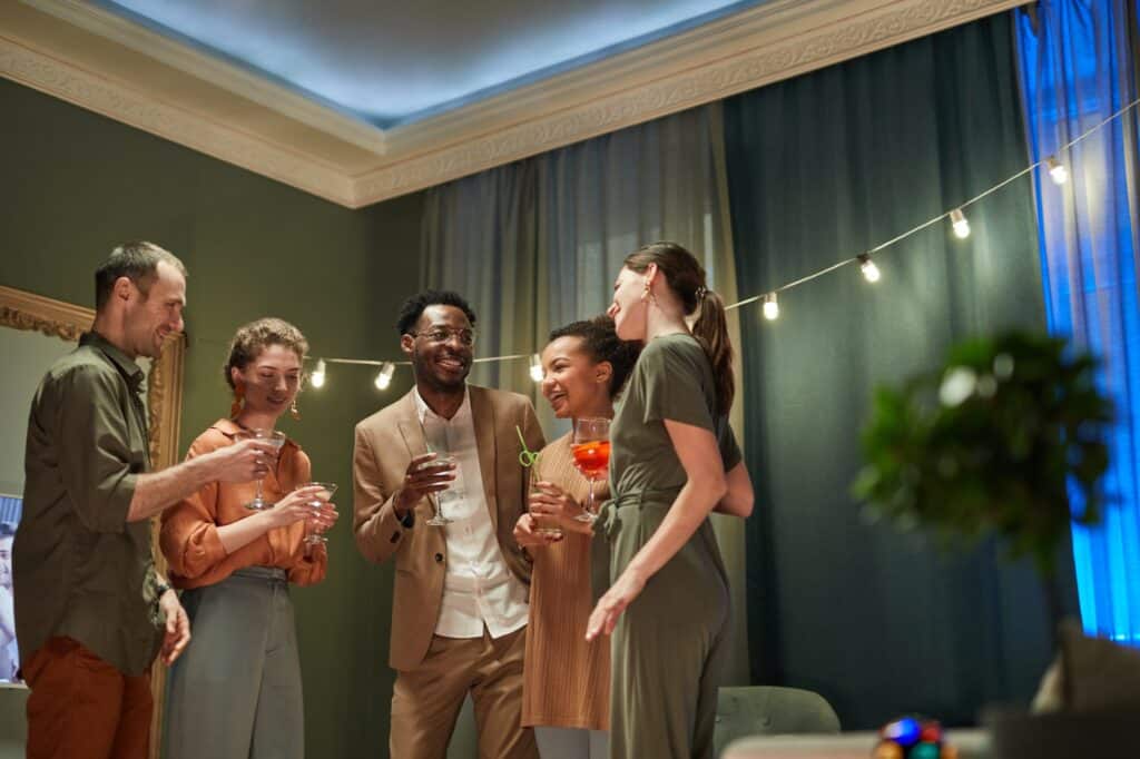 A small group of friends celebrating the house move